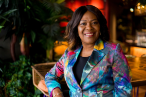 Author Millicent Clarke stuns in a vibrant printed suit